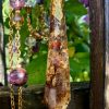 Cristaux de cacoxénite ou super seven moulés en résine époxy avec des feuilles d'or