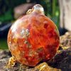 pendentif bulle de cornaline avec feuille d'or dans résine
