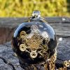 pendentif protection obsidienne dorée avec symbole de métatron