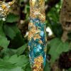 pointe de quartz aura dans résine avec laiton et or