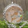 cristal de roche pendentif talisman et feuilles d'or